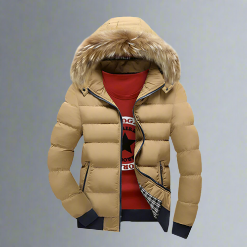 The Yellow Pandora Mens Two Tone Puffer Jacket with Removable Hood in tan, shown over a red shirt with a black star and circular text, is displayed against a plain light gray background.