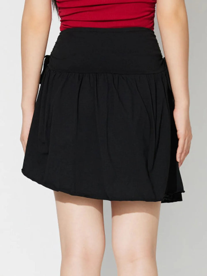 Side Tie Asymmetric Hem Mini Skirt - cas7m
