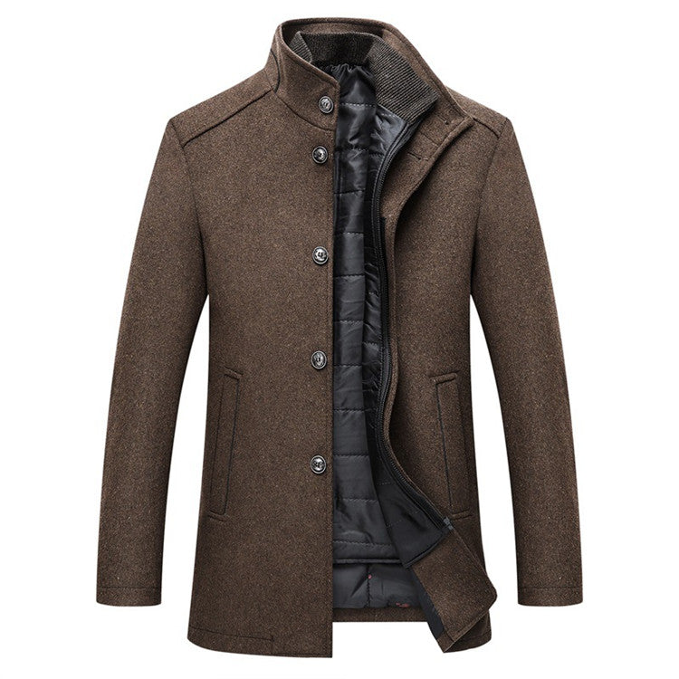 The Teal Simba Winter Men Wool Jacket is a brown, slim-fit, thick, warm coat with a standing collar and two front pockets. It features a button-up design and dark quilted lining for warmth. Item follows Asian sizes.