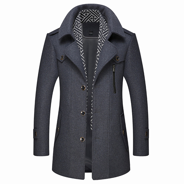 The Teal Simba Winter Scarf Detachable Scarf Jacket is a modern men's wool coat in dark gray with a high collar, button front, zippered chest pocket, buttoned cuffs, shoulder epaulets, decorative lining, and a detachable scarf.
